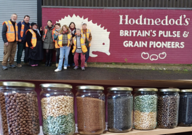 hodemdod team with banner and jars of pulses