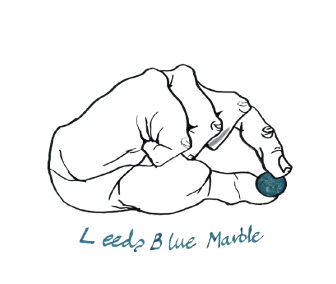 Blue Marble Composting hand holding a blue marble